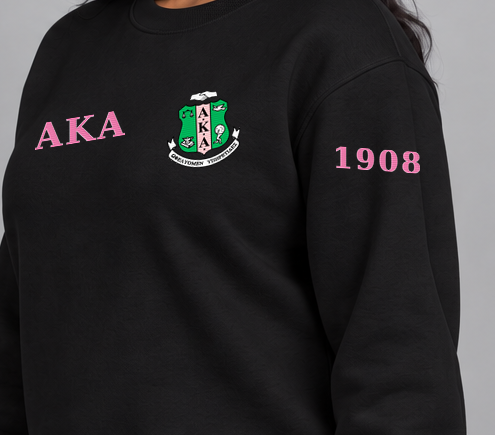 Alpha Kappa Alpha premium embroidered black solid crewneck sweatshirt on model - founding year sleeve detail