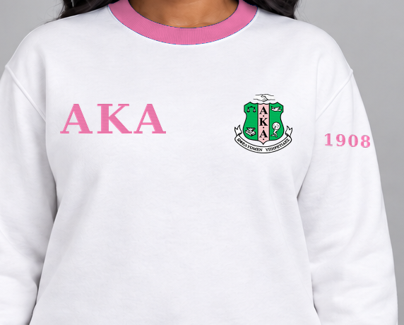 Alpha Kappa Alpha premium embroidered white solid contrast trim crewneck sweatshirt on model - chest embroidery close-up