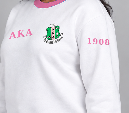 Alpha Kappa Alpha premium embroidered white solid contrast trim crewneck sweatshirt on model - founding year sleeve detail