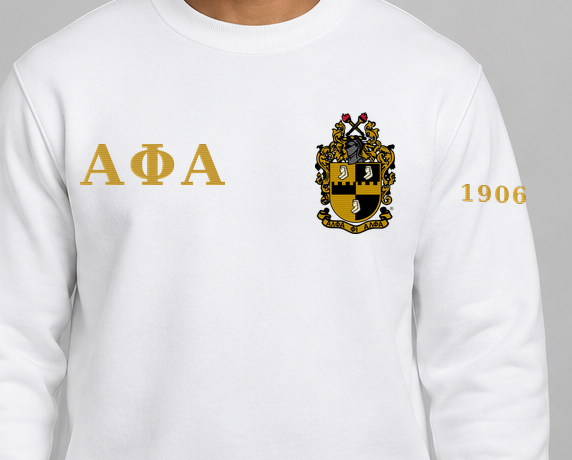 Alpha Phi Alpha premium embroidered white solid crewneck sweatshirt on model - chest embroidery close-up