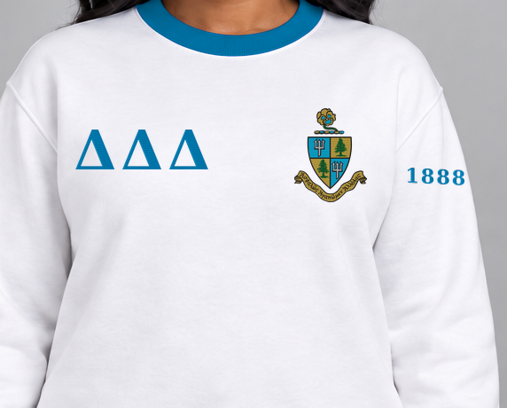 Delta Delta Delta premium embroidered white solid contrast trim crewneck sweatshirt on model - chest embroidery close-up