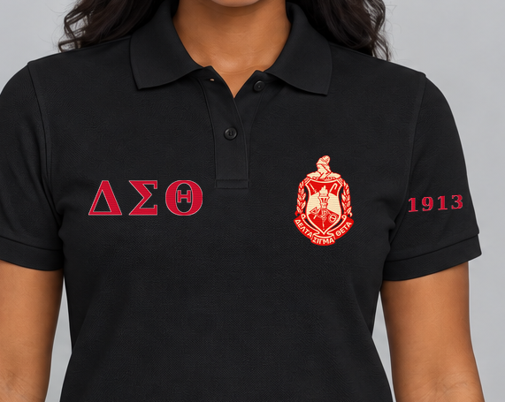 Delta Sigma Theta premium embroidered black solid polo on model - chest embroidery close-up