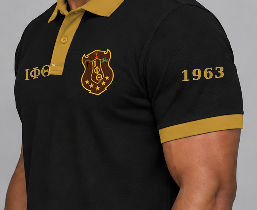 Iota Phi Theta premium embroidered black solid contrast trim polo on model - founding year sleeve detail