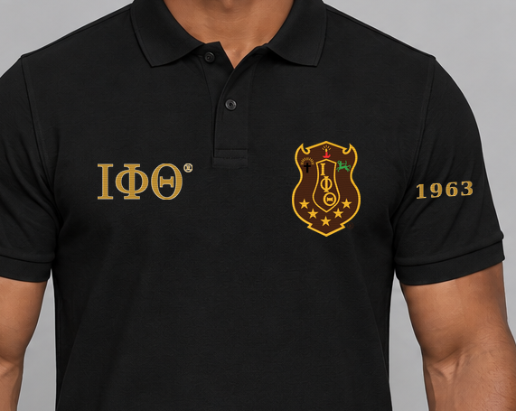 Iota Phi Theta premium embroidered black solid polo on model - chest embroidery close-up