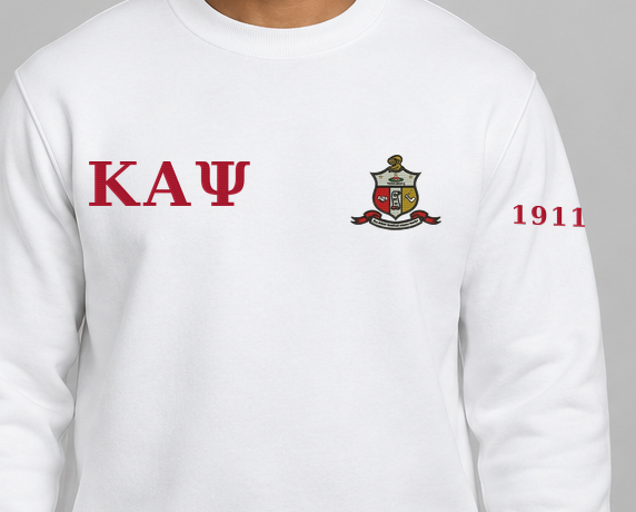 Kappa Alpha Psi premium embroidered white solid crewneck sweatshirt on model - chest embroidery close-up