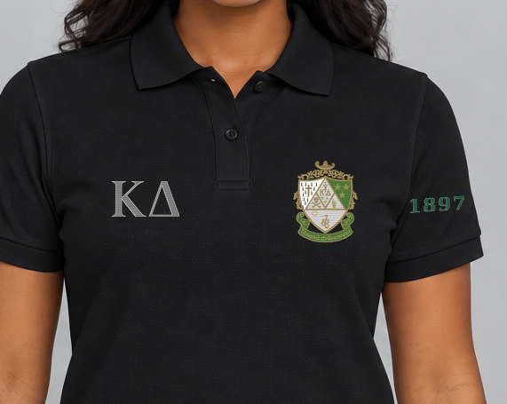 Kappa Delta premium embroidered black solid polo on model - chest embroidery close-up