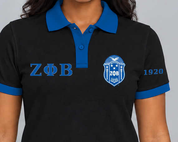 Zeta Phi Beta premium embroidered black solid contrast trim polo on model - chest embroidery close-up