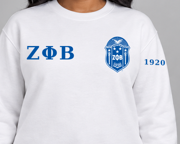 Zeta Phi Beta premium embroidered white solid crewneck sweatshirt on model - chest embroidery close-up