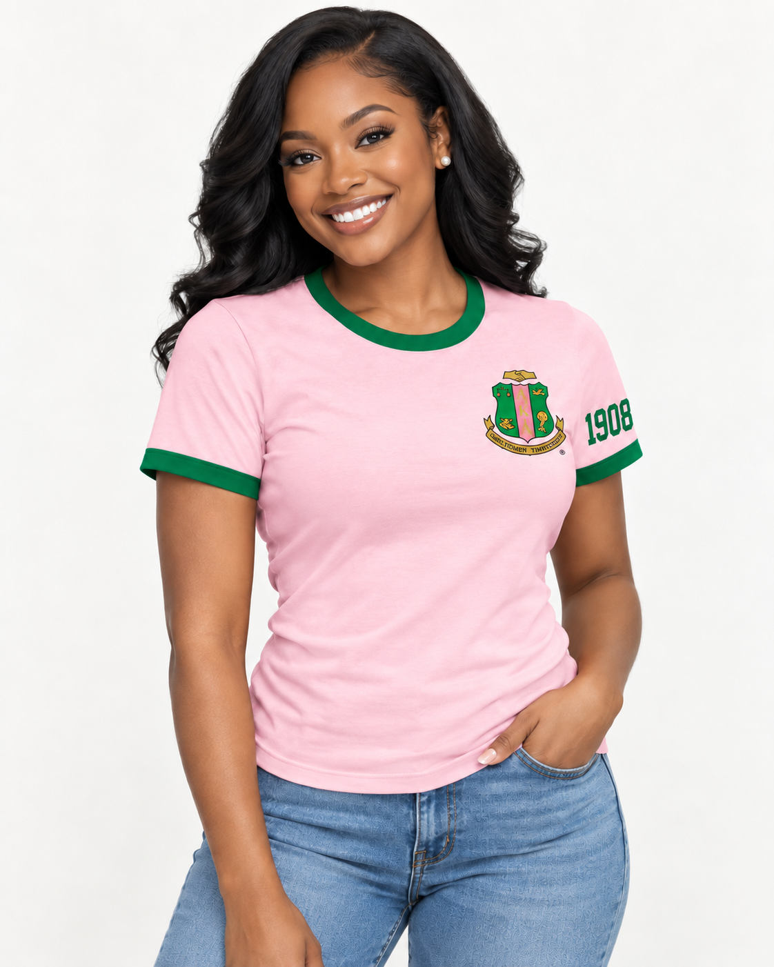Black woman modeling pink Alpha Kappa Alpha ringer T-shirt with green trim, left chest crest, and 1908 on the same-side sleeve