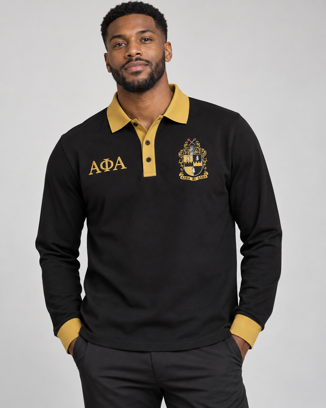 Alpha Phi Alpha black body old gold collar placket and cuffs long sleeve contrast polo on male model