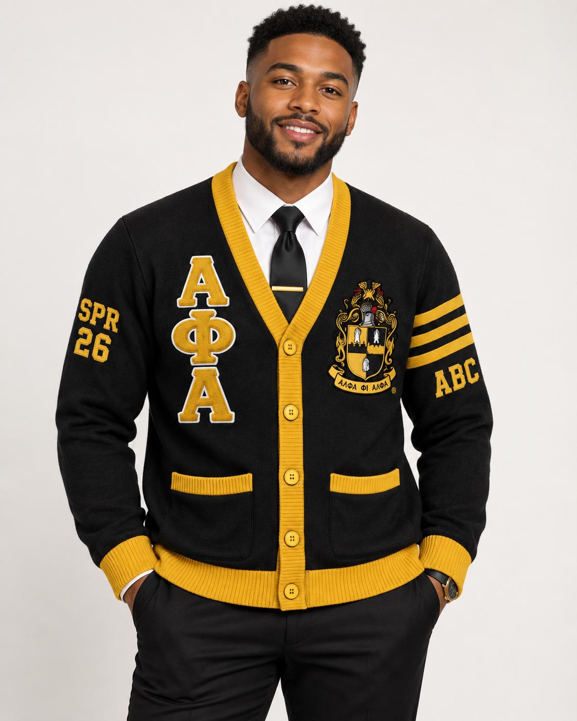 Alpha Phi Alpha custom cardigan in black and gold shown on model