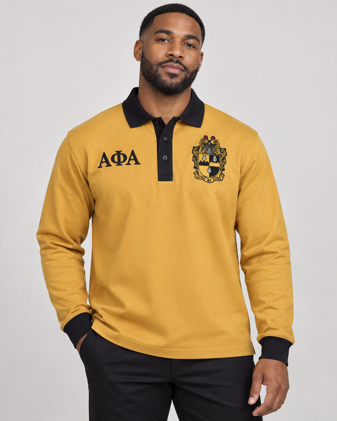 Alpha Phi Alpha old gold body black collar placket and cuffs long sleeve contrast polo on male model