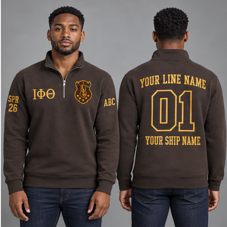 Iota Phi Theta Charcoal Brown and Gilded Gold personalized quarter-zip sweatshirt on an adult model, original supplied crest and ΙΦΘ letters, sample line name, line number01, ship name, crossing year and chapter initials.