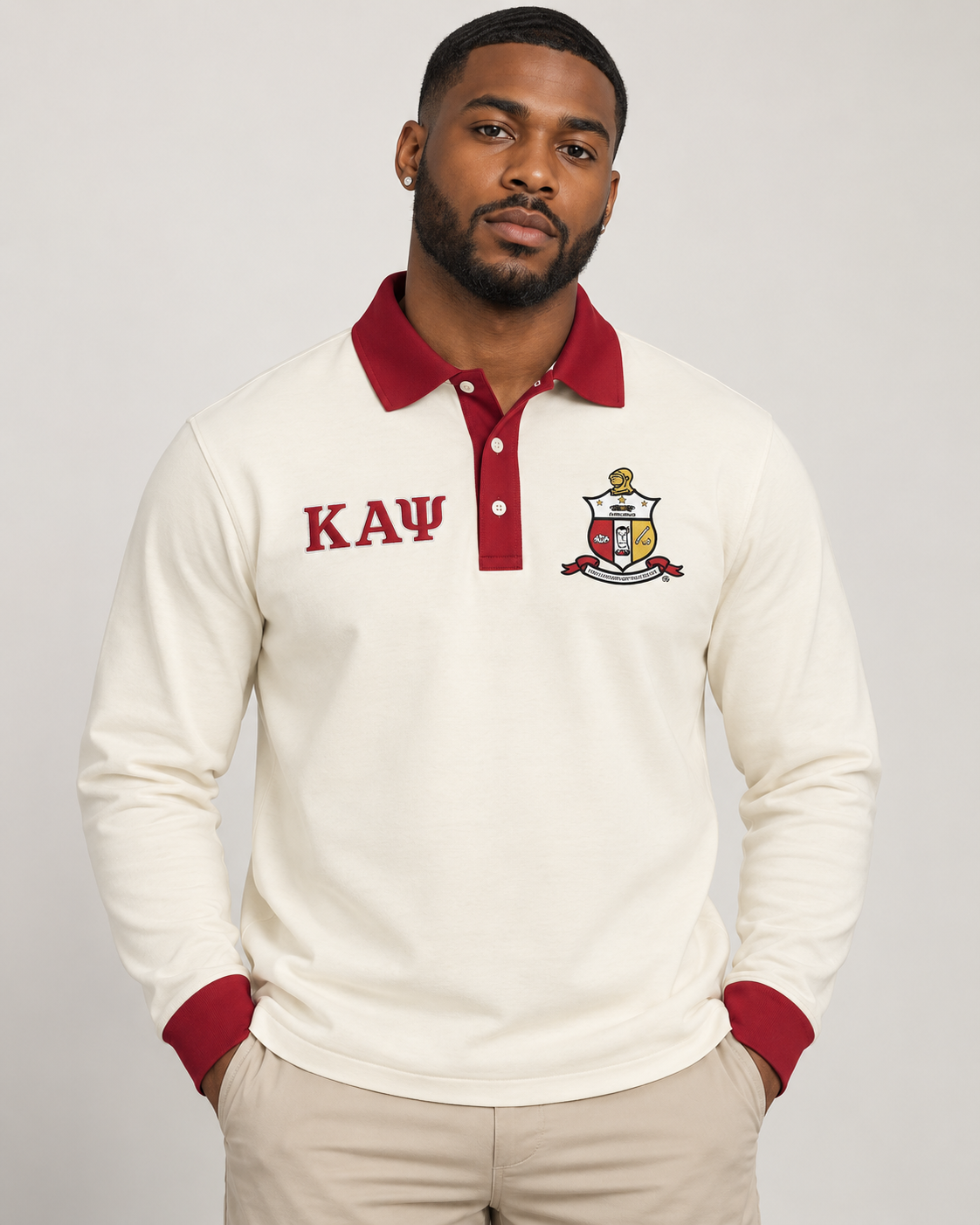 Kappa Alpha Psi cream body crimson collar placket and cuffs long sleeve contrast polo on male model