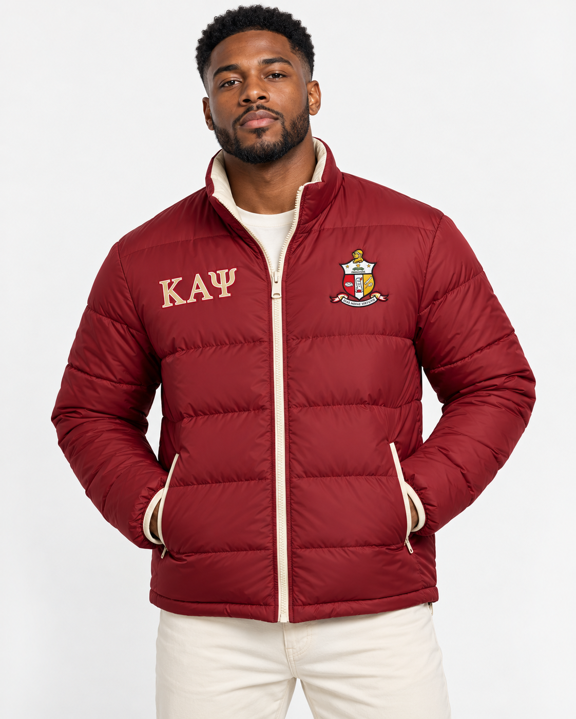 Kappa Alpha Psi crimson puffer jacket with cream contrast and embroidery on male model