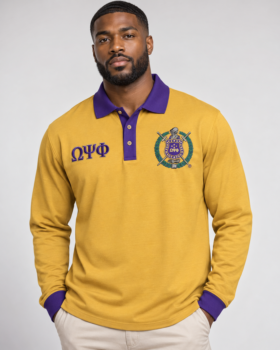 Omega Psi Phi old gold body purple collar placket and cuffs long sleeve contrast polo on male model