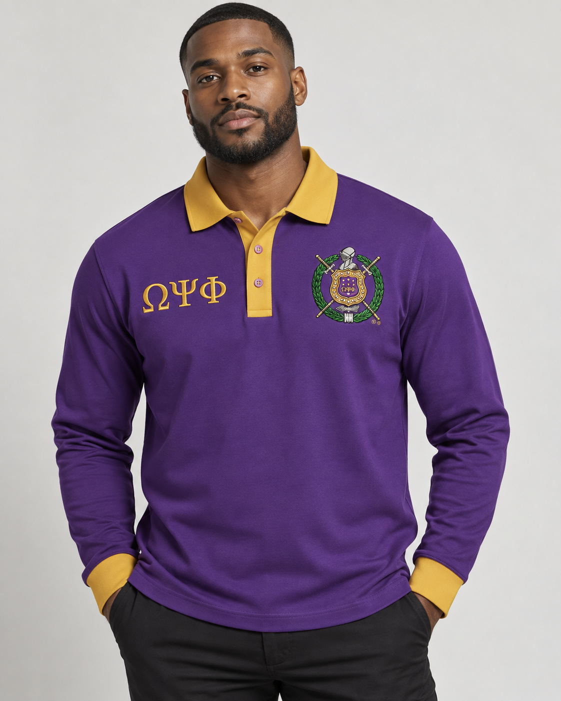 Omega Psi Phi purple body old gold collar placket and cuffs long sleeve contrast polo on male model
