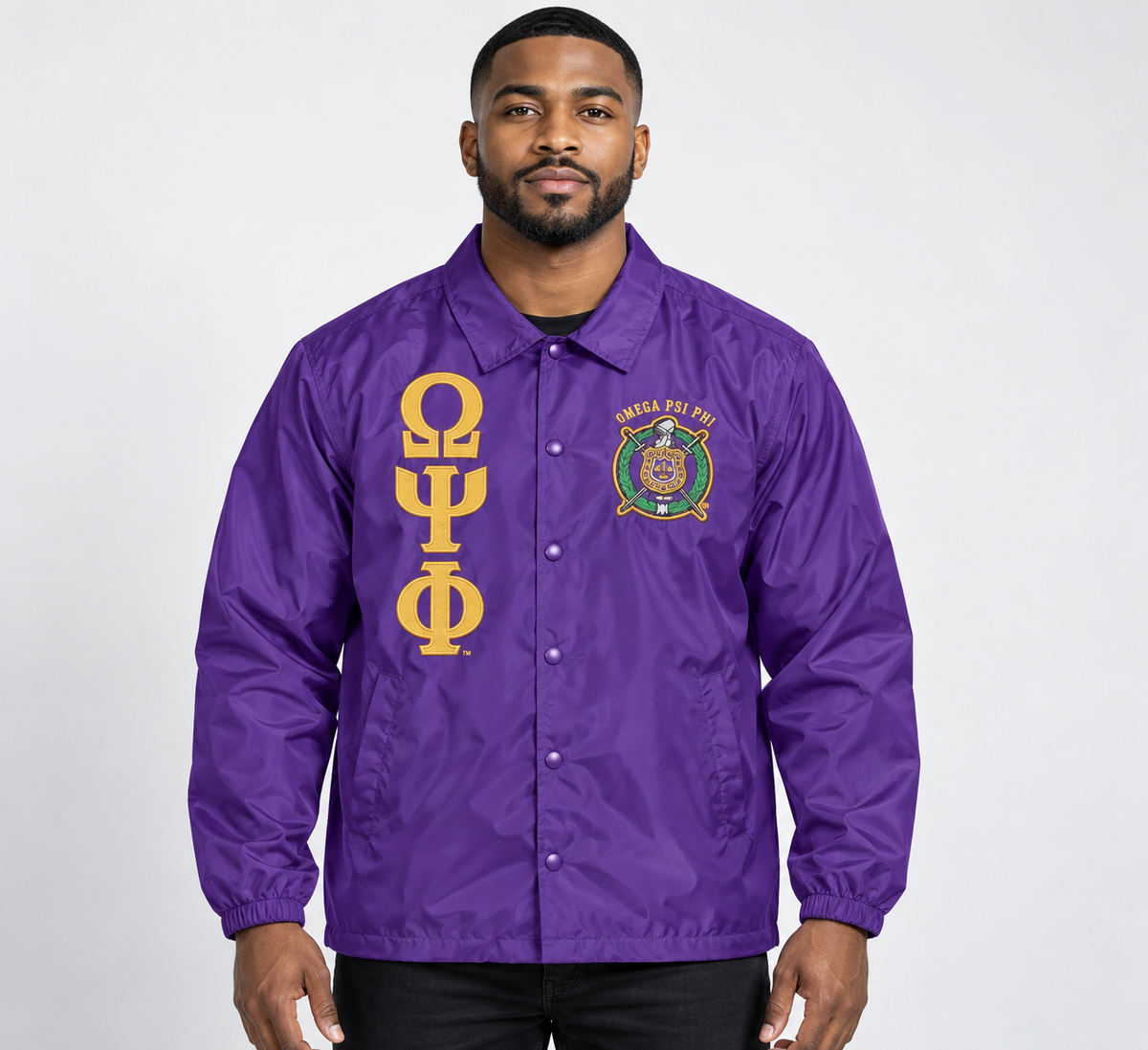 Purple Omega Psi Phi line jacket on male model