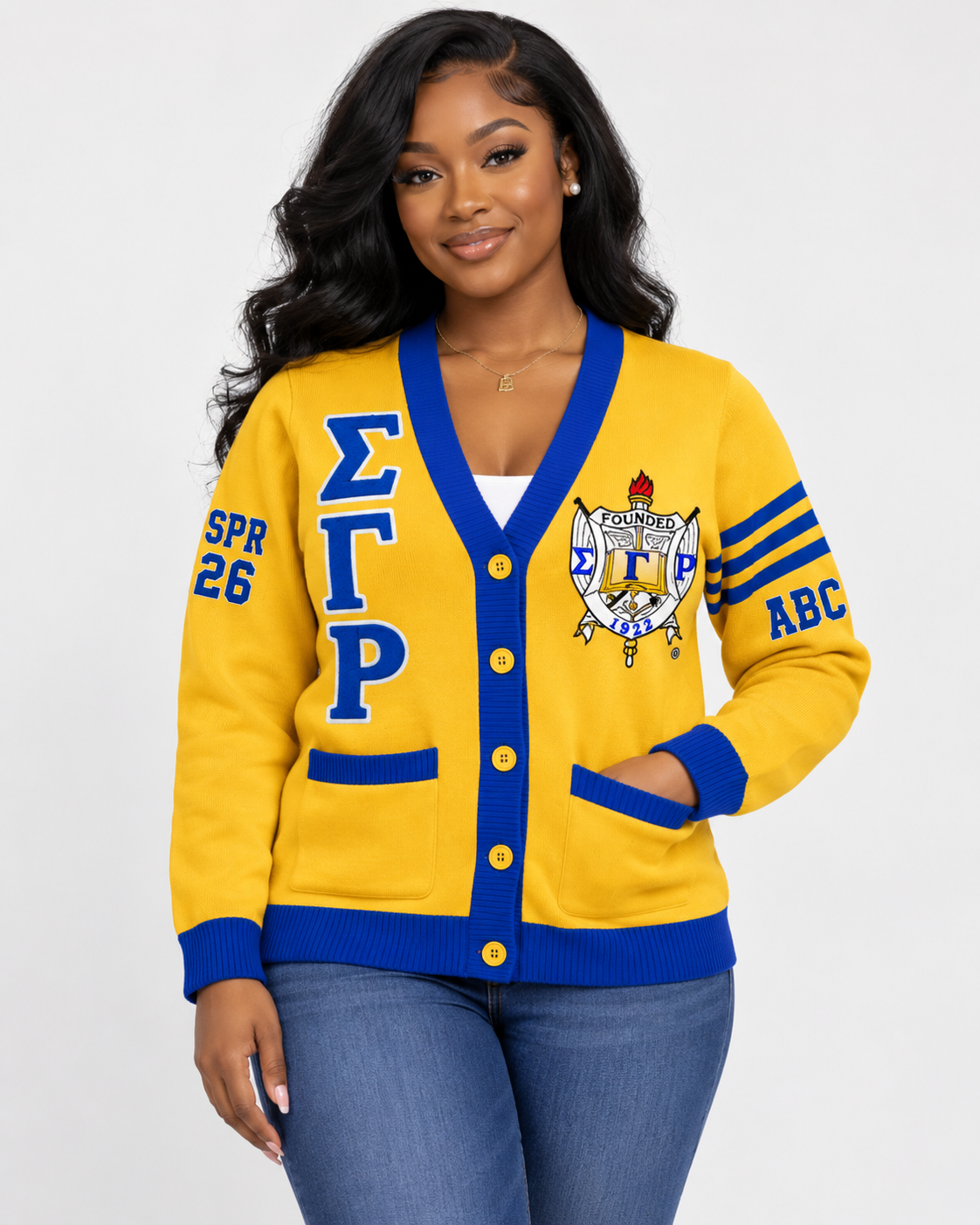Sigma Gamma Rho custom cardigan in gold and royal blue shown on model