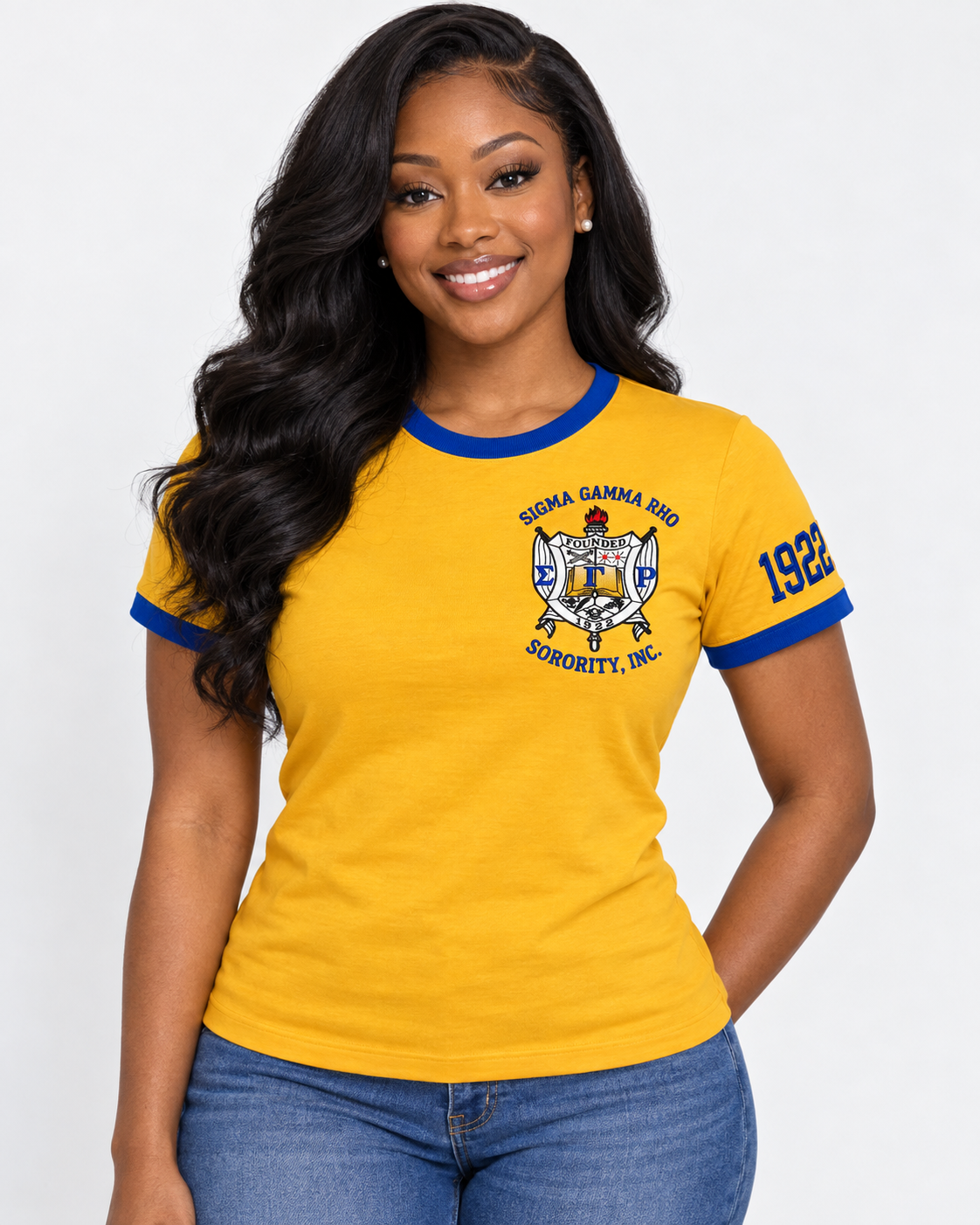 Black woman modeling Sigma Gamma Rho embroidered ringer T-shirt in gold with royal blue trim and 1922 sleeve embroidery