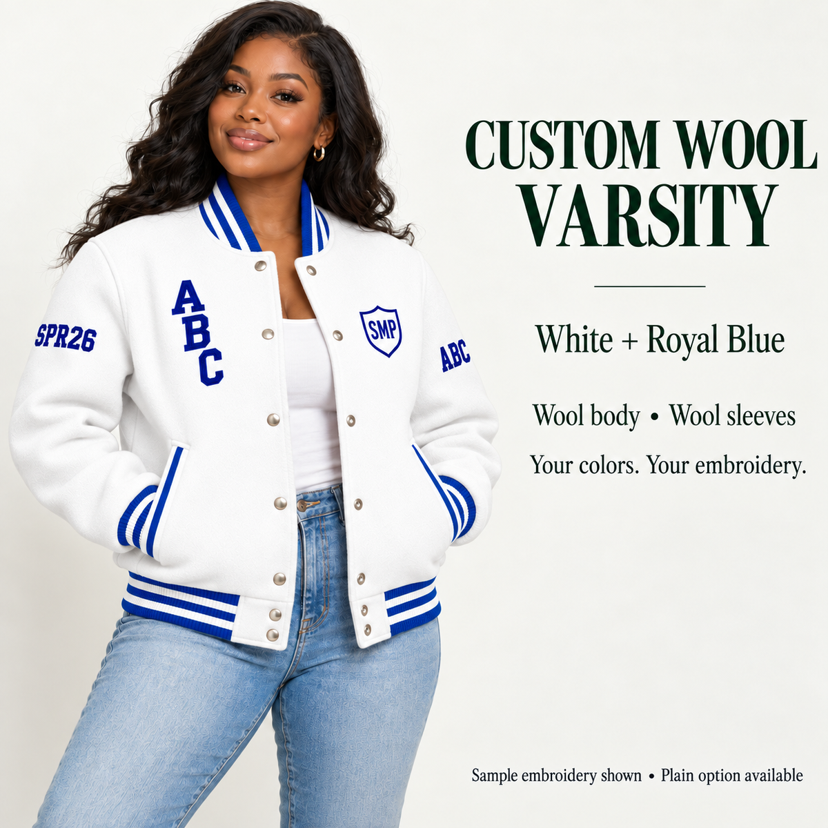 Woman wearing White wool body and wool sleeve varsity jacket with Royal Blue sample embroidery