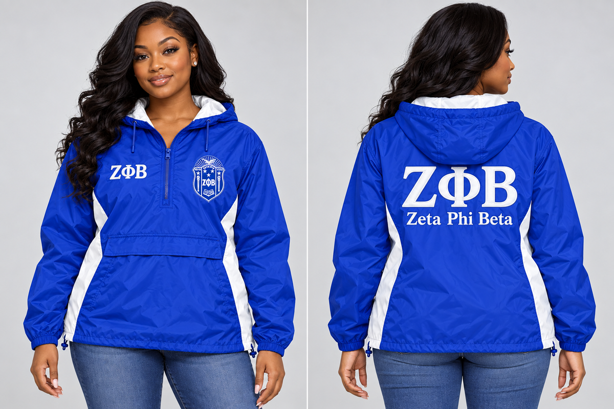 Black woman modeling Zeta Phi Beta royal blue and white custom embroidered hooded anorak windbreaker jacket, front and back views.